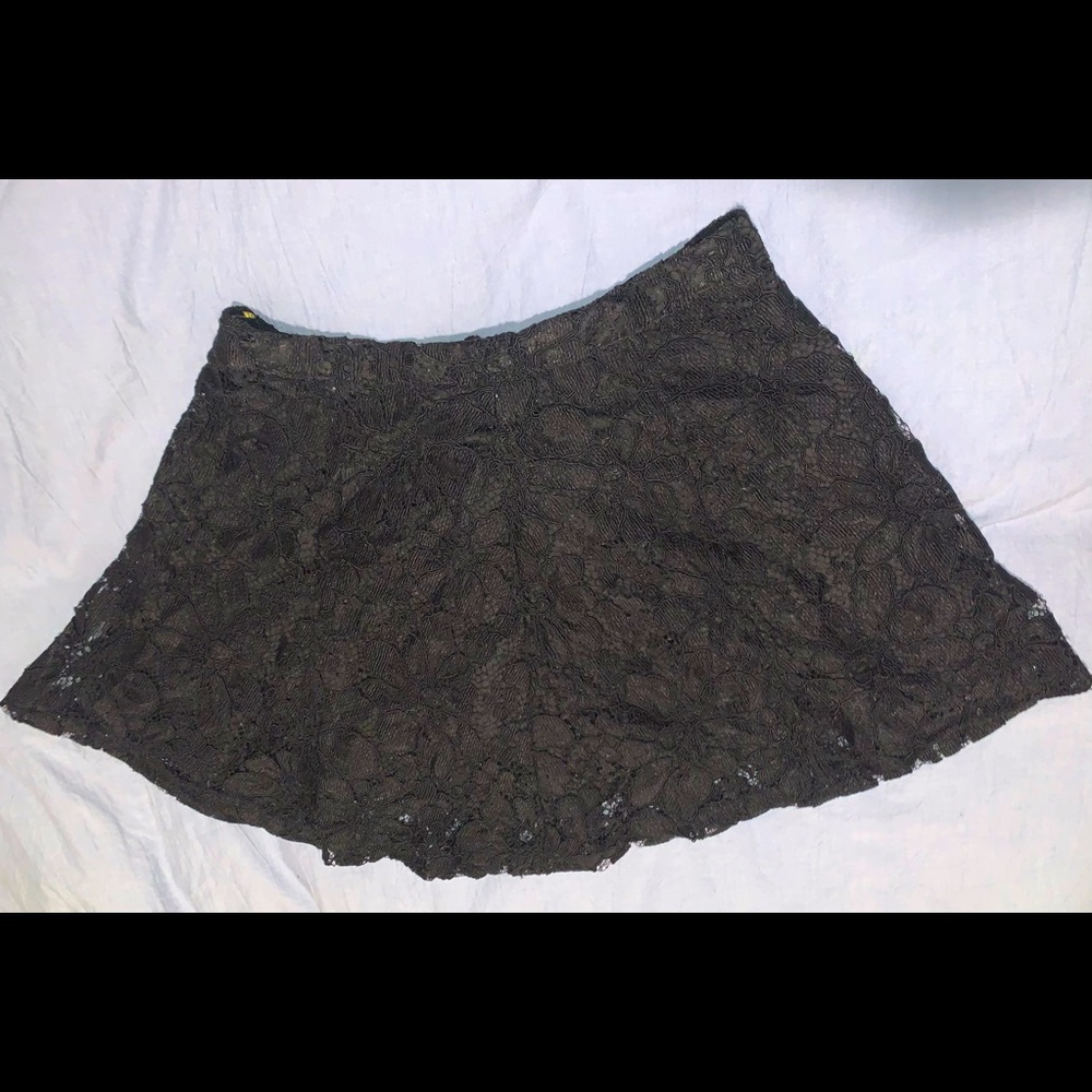 Black mini skirt with sown details